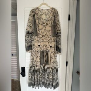 Black and cream pattern dress with beautiful details